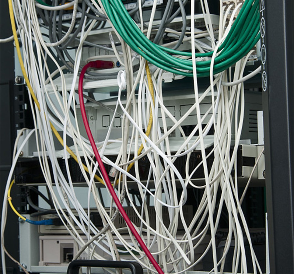 Unorganized cabinet wires before terminal block rewiring
